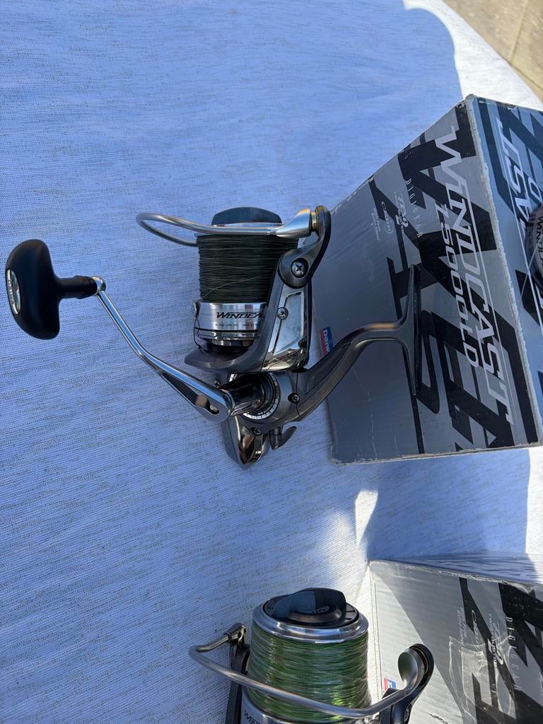 2x Daiwa Windcast Z5000LD met extra spoel in originele doos, Ophalen of Verzenden, Gebruikt, Molen