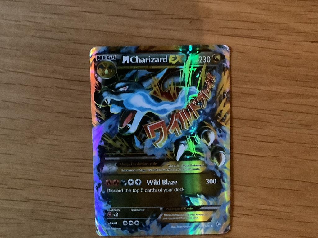 Mega M Charizard EX Pokémon Kaart - Zeldzaam en Foil, Ophalen of Verzenden, Gebruikt, Losse kaart, Foil