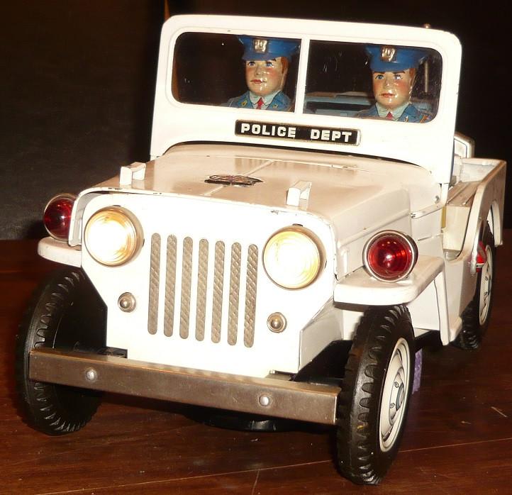TN Nomura jeep police dept batt. operated japanese tintoy, Antiek en Kunst, Antiek | Speelgoed, Ophalen of Verzenden