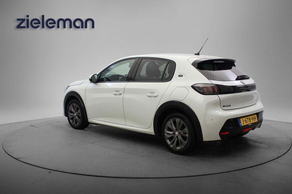 Peugeot E-208 Allure 50 kWh - Digital Cockpit, Carplay, Half, Gebruikt, Met garantie (alle), Wit, Origineel Nederlands