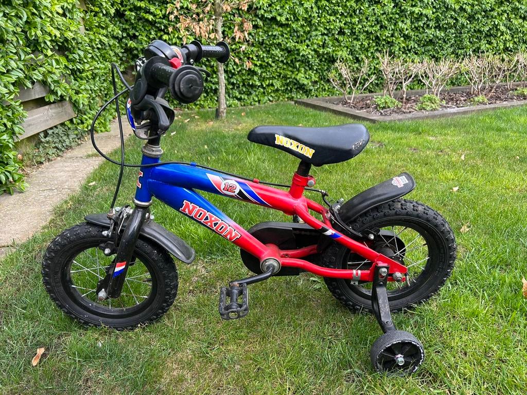 Te koop Kinderfietsje 12 inch, Fietsen en Brommers, Ophalen, Gebruikt, Minder dan 16 inch, Zijwieltjes