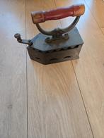 Kolen strijkijzer, Ophalen