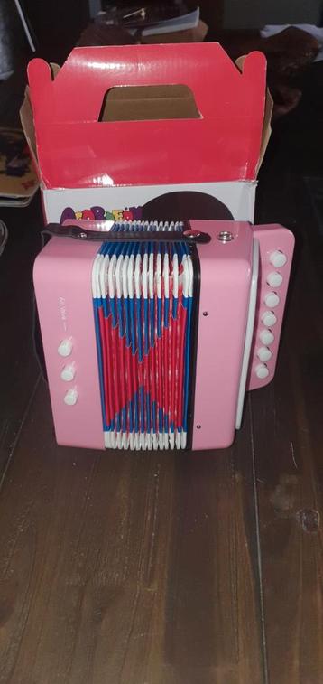 Roze Kinderaccordeon met Doos beschikbaar voor biedingen