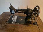 Lada voetpedaal naaimachine, Ophalen