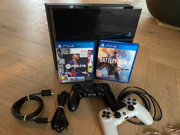 PS4 met 2 controllers en games beschikbaar voor biedingen