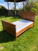 Houten twijfelaar bed, Ophalen