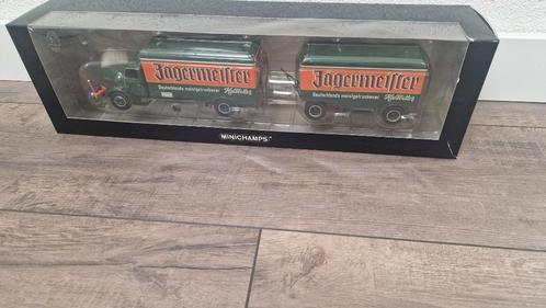 Henschel HS140 jagermeister  mit 2-achse Pritschen anhanger, Hobby en Vrije tijd, Modelauto's | 1:43, Zo goed als nieuw, Bus of Vrachtwagen