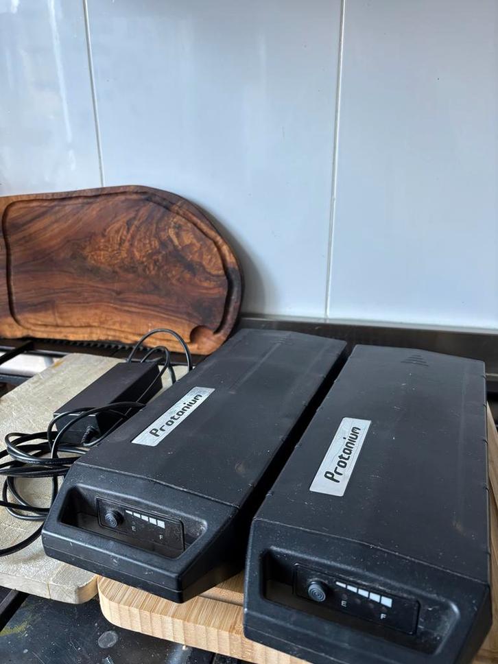 2x Protanium Accu's + Lader (Revisie Nodig), Fietsen en Brommers, Fietsaccessoires | Fietsaccu's, Gebruikt, Ophalen