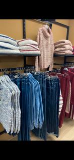 Kledingwinkel interieur, Ophalen