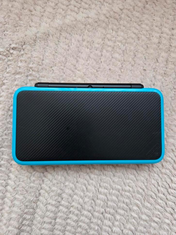 New Nintendo 2DS XL with accessories, Spelcomputers en Games, Spelcomputers | Nintendo 2DS en 3DS, Gebruikt, 2DS XL, Overige kleuren