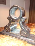 Zware marmeren klok, Ophalen