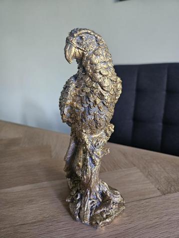 Beeldje ara goud beschikbaar voor biedingen
