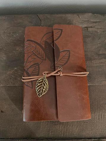 Notitie boekje leer beschikbaar voor biedingen