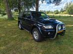 Mitsubishi Pajero Sport 2.5 TD GLS 2004, Auto's, Bestelauto's, 145 pk, Stof, Zwart, 4 cilinders