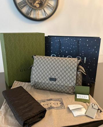 Gucci luiertas incl bon beschikbaar voor biedingen