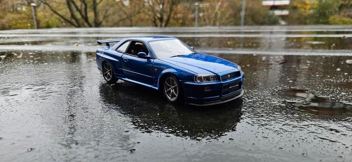 1:18 Nissan skyline GT-R R34 V-spec blue AutoArt, Hobby en Vrije tijd, Modelauto's | 1:18, Zo goed als nieuw, Auto, Autoart, Ophalen of Verzenden