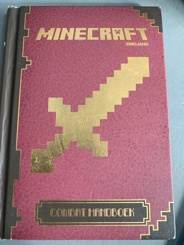 Minecraft combat handboek - Mojang, Boeken, Kinderboeken | Jeugd | onder 10 jaar, Zo goed als nieuw, Fictie algemeen, Ophalen of Verzenden