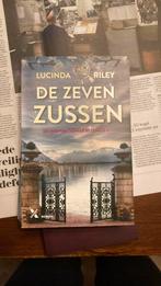 De zeven zussen, Lucinda Riley. Ziet er nog heel keurig uit, Ophalen of Verzenden, Zo goed als nieuw