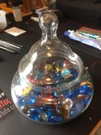 karaf met glasstukjes, Ophalen