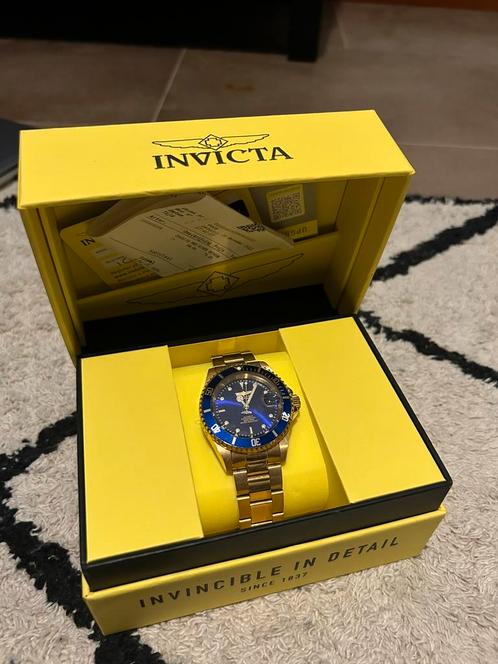 Invicta horloge goud/blauw, Sieraden, Tassen en Uiterlijk, Horloges | Dames, Zo goed als nieuw, Polshorloge, Overige merken, Goud