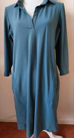 Mooie grijs/blauwe jurk van Poools travelstof. Mt 38/40, Maat 38/40 (M), Blauw, Nieuw, Ophalen of Verzenden