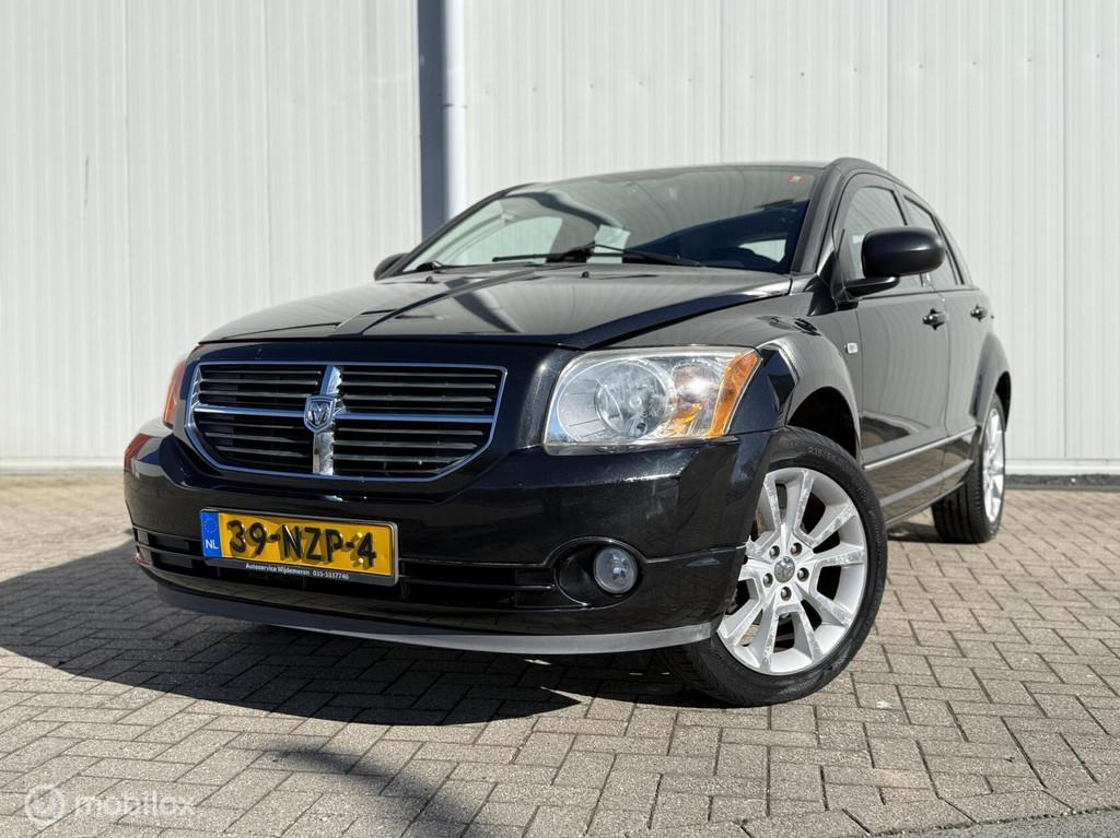Dodge Caliber 2.0 Sport Airco 1e eigenaar Cruise Stoel verw., Auto's, Dodge, Voorwielaandrijving, 450 kg, Gebruikt, Zwart