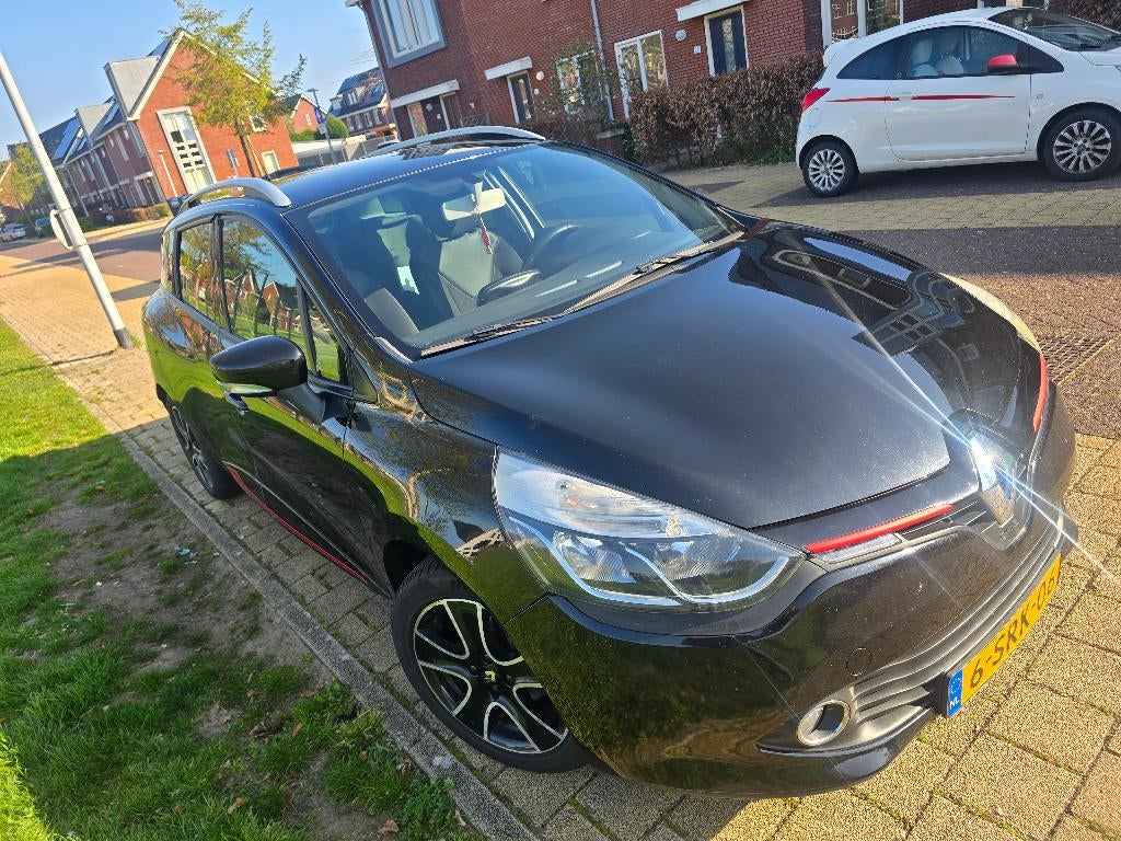 Renault Clio 1.5 DCI 66KW Estate 2013 Zwart, Auto's, Voorwielaandrijving, Stof, Metallic lak, Zwart