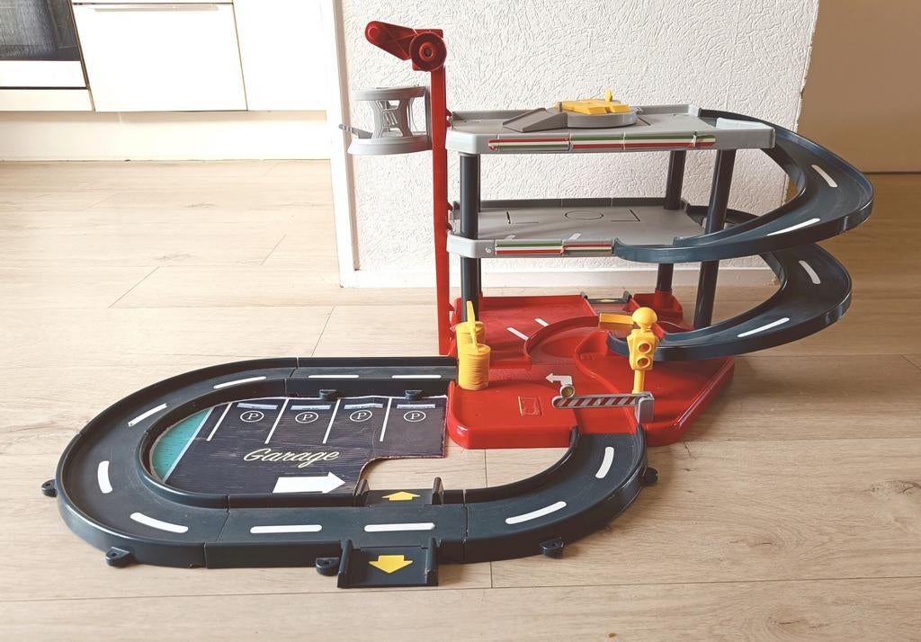 Autogarage speelgoed met spiraalbaan en parkeerplaats, Ophalen of Verzenden, Gebruikt