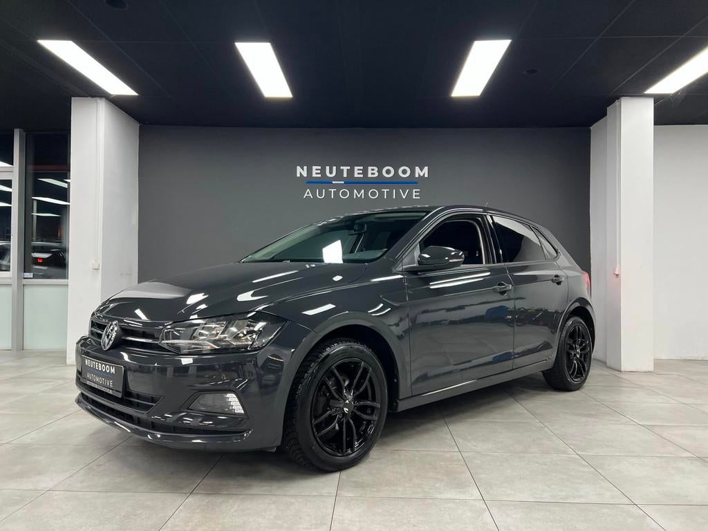Volkswagen Polo 1.0 Business | PDC | Clima | Stoelverwarming, Auto's, 1005 kg, Stof, Gebruikt, Zwart