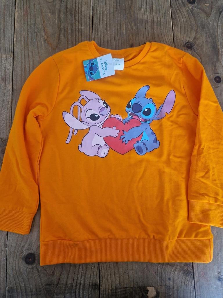 Oranje trui van stitch te koop maat 128/134, Ophalen, Meisje, Trui of Vest