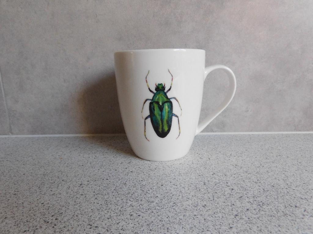 Mok 10x8,5 cm. Kever, Ophalen of Verzenden, Zo goed als nieuw, Overige stijlen, Kop(pen) en/of Schotel(s)
