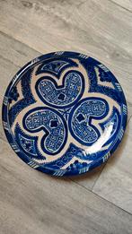 Handgemaakt Marokkaans wandbord, Ophalen