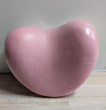 Roze badkussen beschikbaar voor biedingen