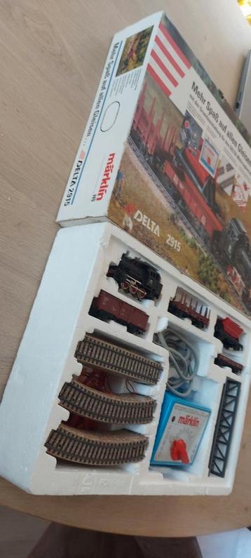 Märklin DB beginnersset met delta loc en 4 wagens rails brug beschikbaar voor biedingen