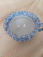 Oude blauw-witte po met deksel, Ophalen