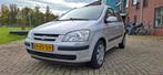 Hyundai Getz 1.3 5DRS 2005 Grijs, Auto's, Voorwielaandrijving, 4 cilinders, Origineel Nederlands, Handgeschakeld