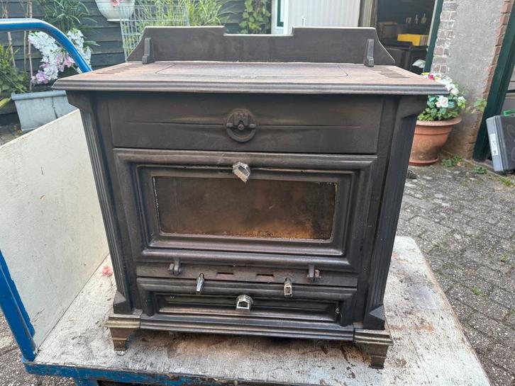 Super gave en nog mooie Westminstrer houtkachel 72 cm breed, Huis en Inrichting, Kachels, Gebruikt, Houtkachel, Hout, Ophalen