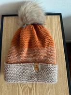 Een muts met een zachte binnenkant, Ophalen, Gedragen