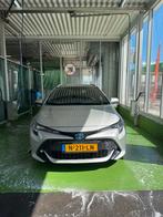 Toyota Corolla TS 1.8 Hybrid 122pk CVT 2021 Grijs, Auto's, 450 kg, 4 cilinders, Stationwagon, Te koop