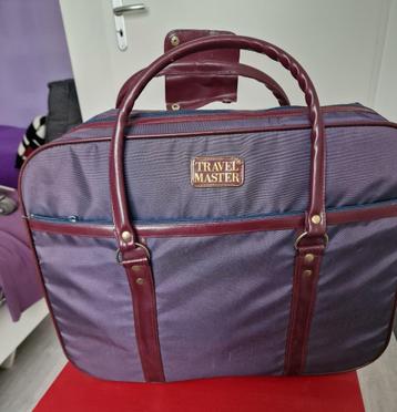 koffer stof in de kleur blauw beschikbaar voor biedingen