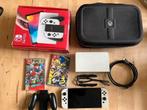 Nintendo Switch OLED + Games + Tas, Spelcomputers en Games, Spelcomputers | Nintendo Switch, Switch OLED, Met games, Met 2 controllers