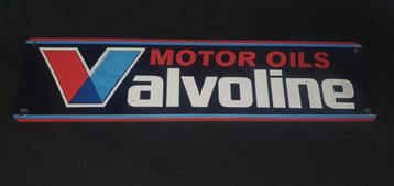 Wandbord van hout valvoline beschikbaar voor biedingen