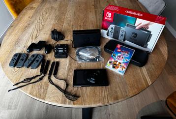 Compleet + extra controller en oplader Nintendo switch beschikbaar voor biedingen