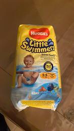 Nieuwe pak huggies zwemluiers, Verzenden, Nieuw, Jongetje of Meisje