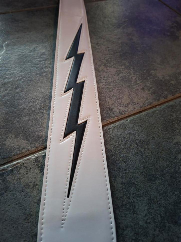 Gitaarband met bliksem design (Ace Frehley), Muziek en Instrumenten, Instrumenten | Toebehoren, Nieuw, Elektrische gitaar, Ophalen of Verzenden