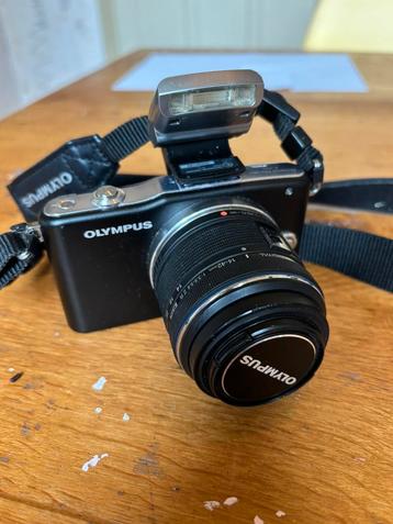 Olympus Pen mini E-PM1 met 14-42mm lens beschikbaar voor biedingen