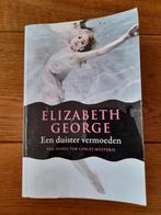 Elizabeth George - Een duister vermoeden, Gelezen, Ophalen of Verzenden, Nederland, Elizabeth George