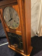 Pendule klok, Ophalen