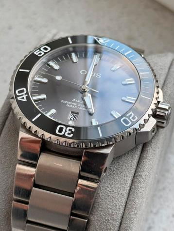 Mooie Oris Aquis Titanium 2023 helemaal compleet beschikbaar voor biedingen