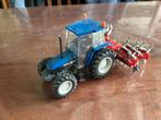 Britians New Holland tractor, Ophalen of Verzenden, Gebruikt, Tractor of Landbouw, Overige merken